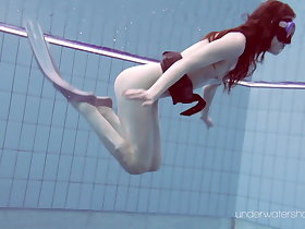 Cheh blue redhead uncovered swimming